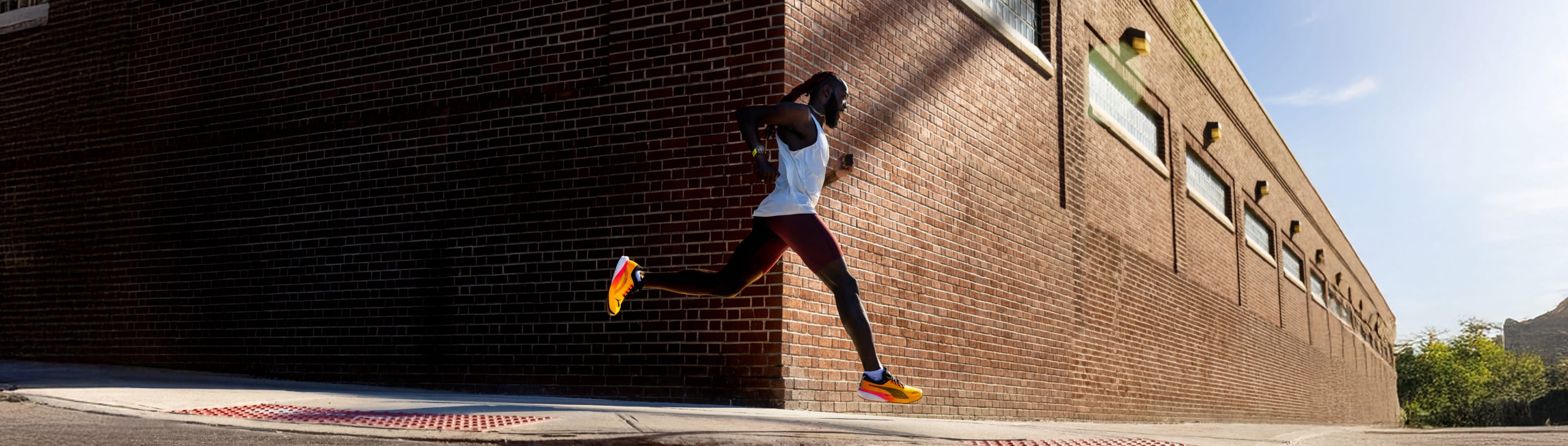Runner training outdoors with a Garmin watch