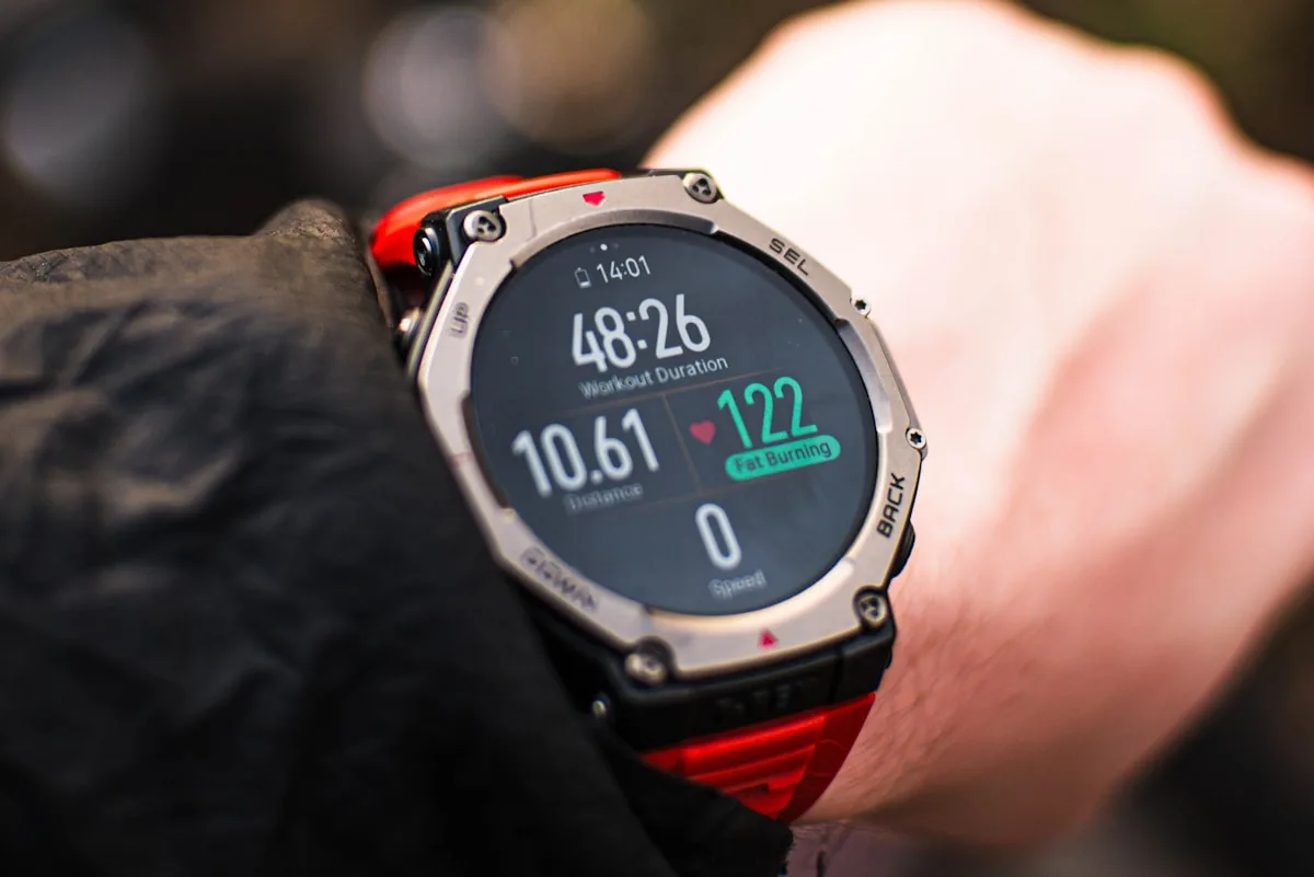 Athlete checking heart rate on a sports watch during a workout