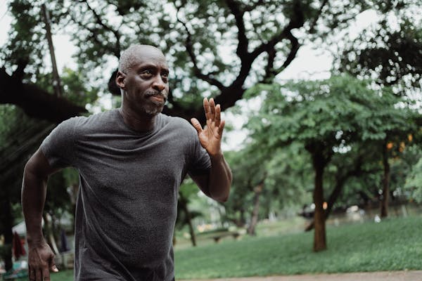 Mature man running in a park