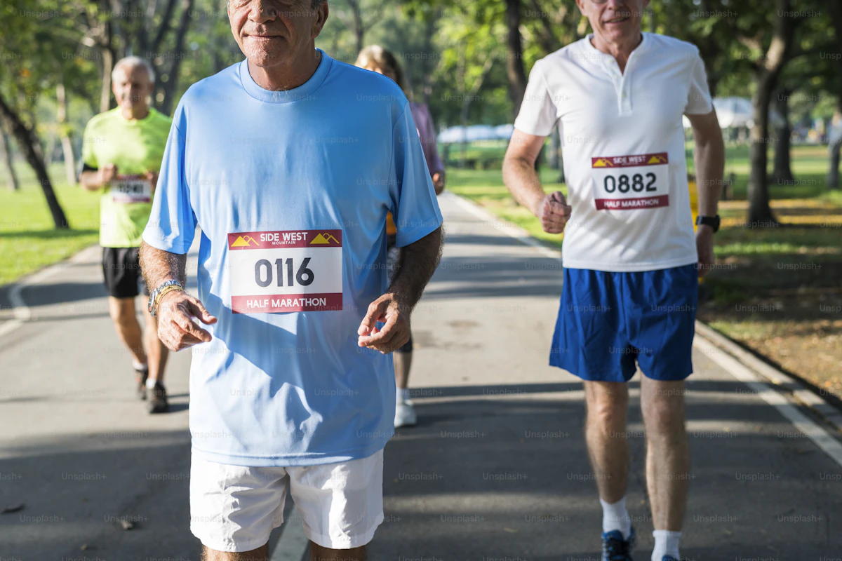 Senior athletes running a half marathon in a park